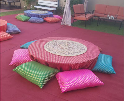 Colourful-Ground-Tabkes-with-6-pillows---AED-150-per-piece-mod